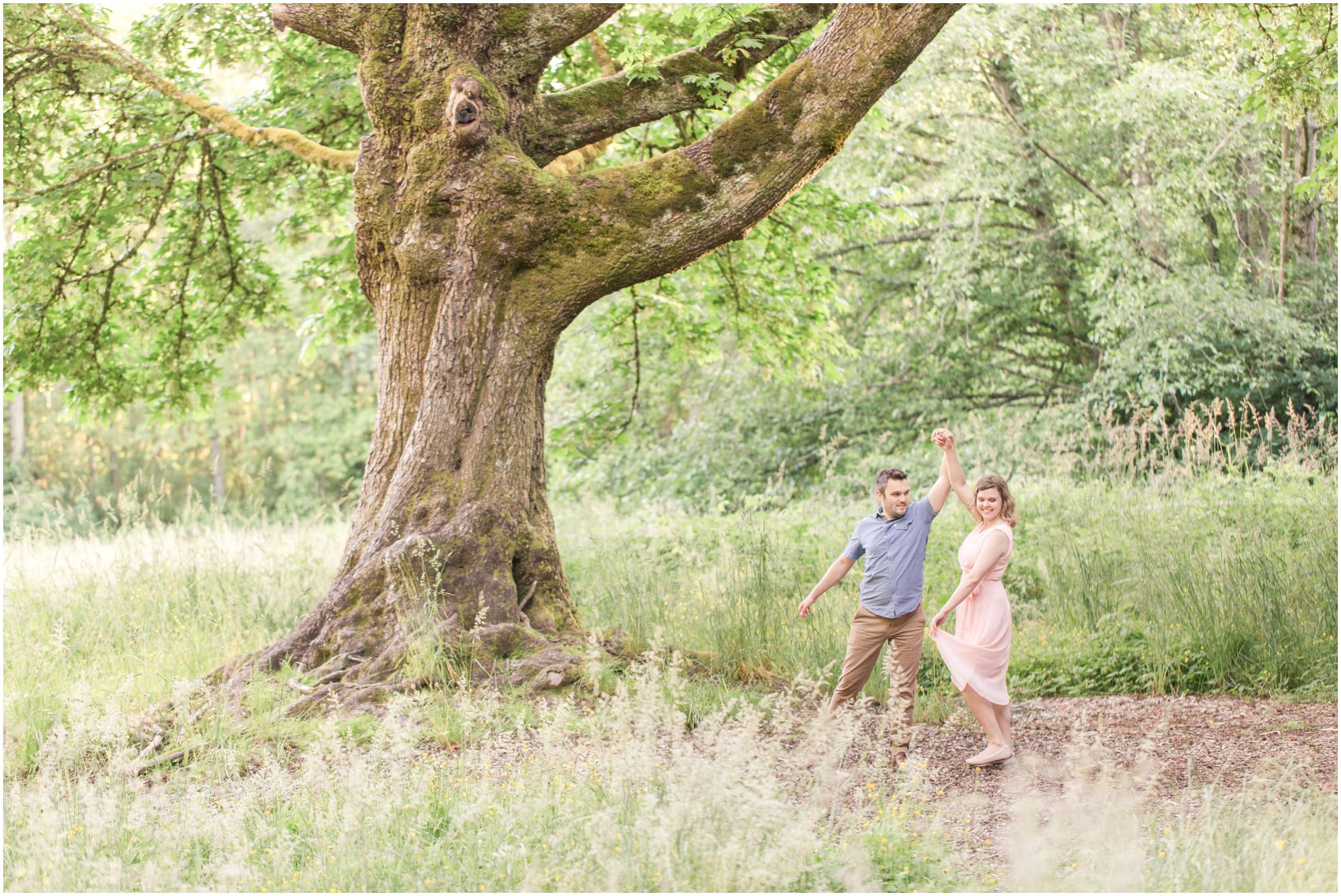 Enchanting Engagement Photos at Redwood Park couple dancing under the great tree