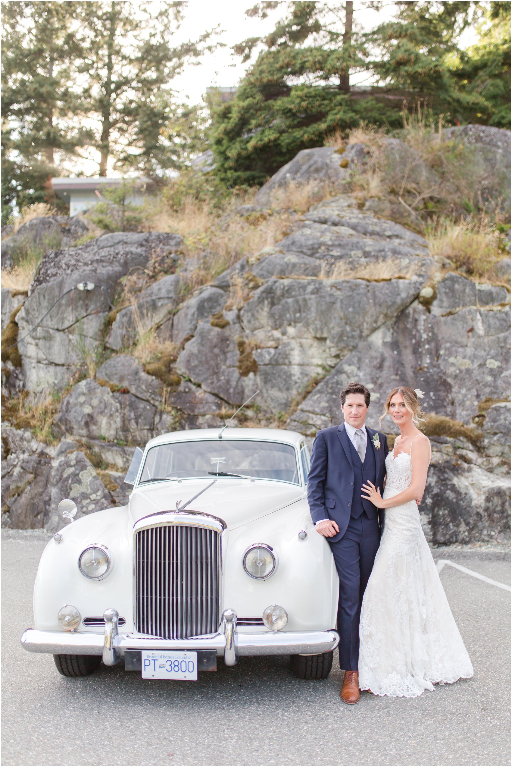 bride and groom portrait with Rolls Royce Classic Car in West Vancouver harbour
