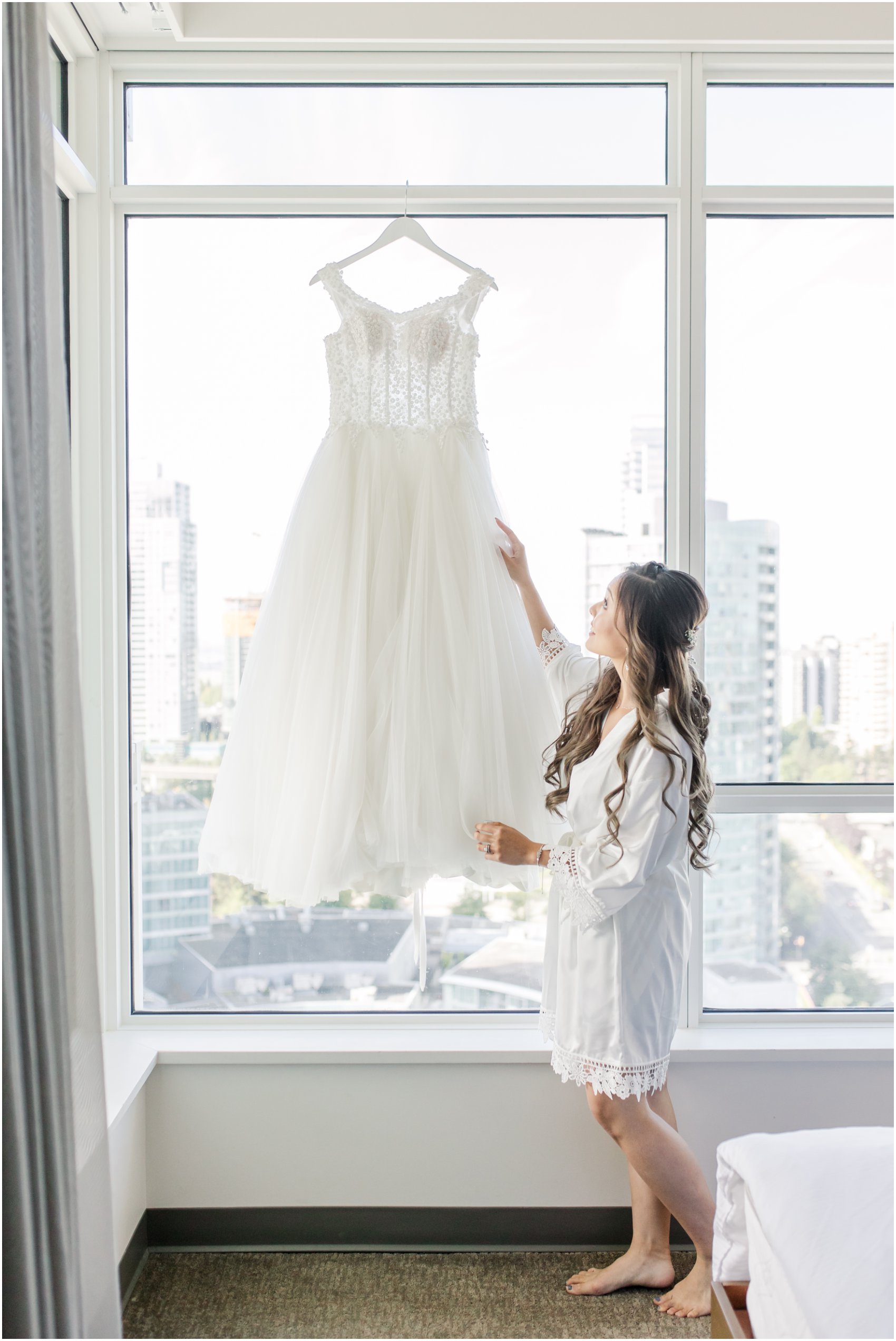 Bride with her wedding dress at hotel in Burnaby, Vancouver