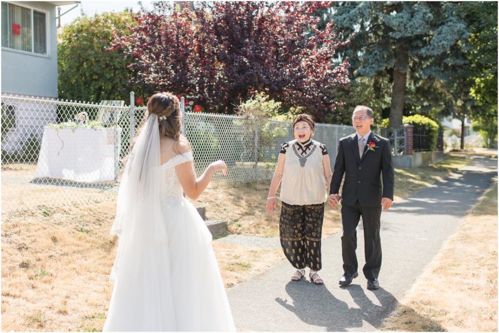 Bride's first look with parents in Vancouver