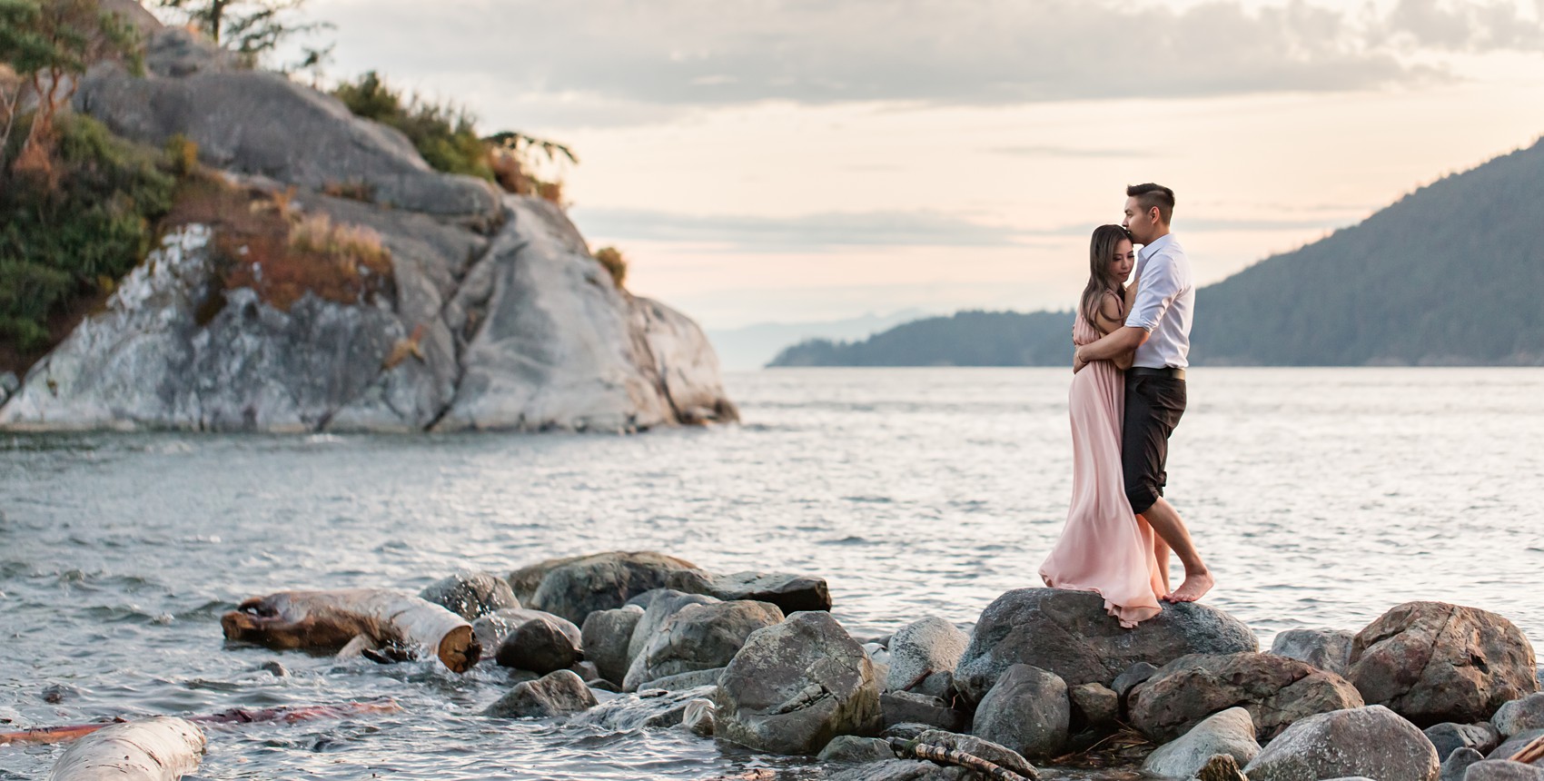 West Vancouver Whytecliff Engagement photos couple on a rock on the water